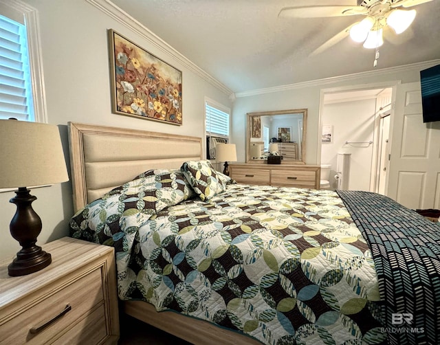 bedroom featuring ornamental molding, connected bathroom, and a ceiling fan