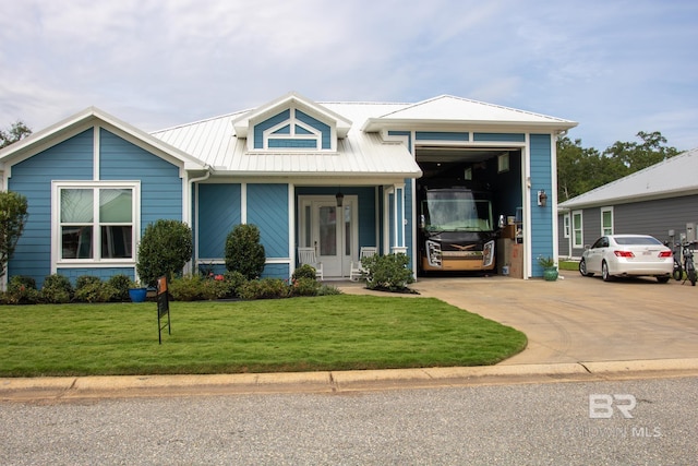 view of front facade with a front lawn and covered porch