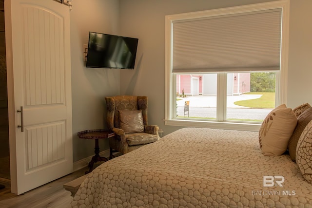 bedroom featuring hardwood / wood-style floors