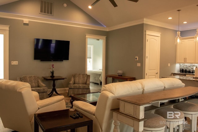 living room featuring ceiling fan and high vaulted ceiling