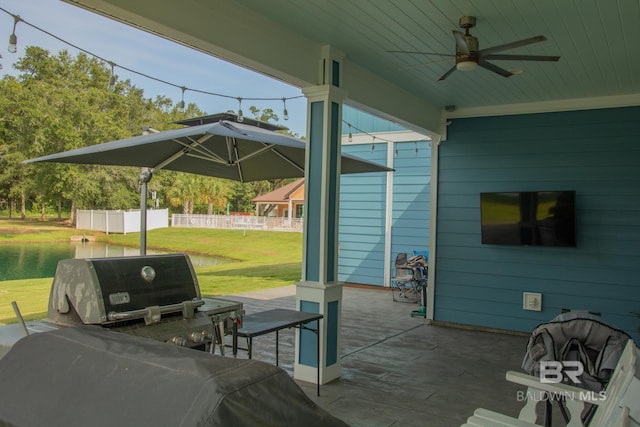 view of patio / terrace featuring ceiling fan