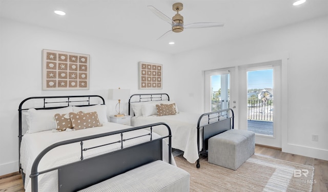 bedroom featuring a ceiling fan, wood finished floors, recessed lighting, baseboards, and access to exterior