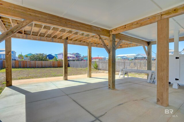 view of patio with fence