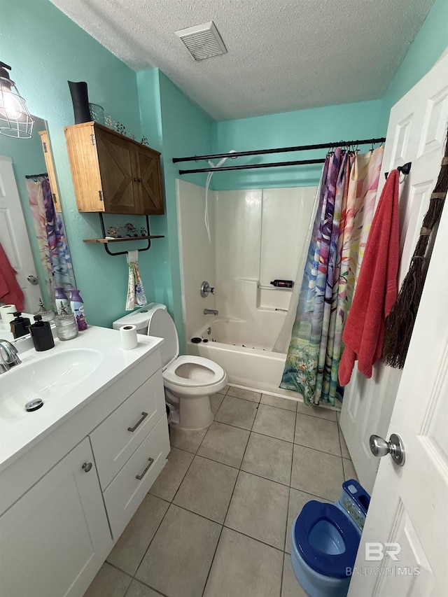 bathroom featuring shower / bath combination with curtain, visible vents, toilet, a textured ceiling, and tile patterned flooring