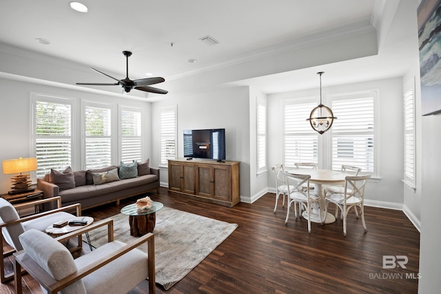 4672 Grander Ct Unit 15B, Orange Beach, AL 36561 - living room with crown molding, a ceiling fan, dark wood-style flooring, baseboards, and a chandelier