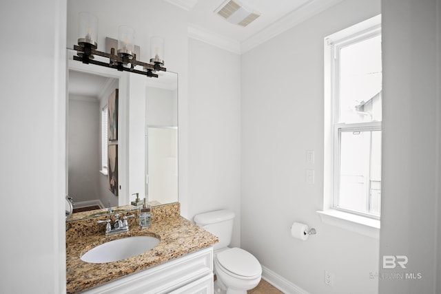 4672 Grander Ct Unit 15B, Orange Beach, AL 36561 - bathroom with ornamental molding, toilet, vanity, and baseboards
