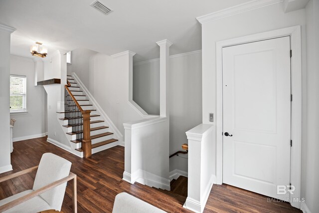 4672 Grander Ct Unit 15B, Orange Beach, AL 36561 - stairs featuring wood finished floors, baseboards, ornamental molding, and a chandelier