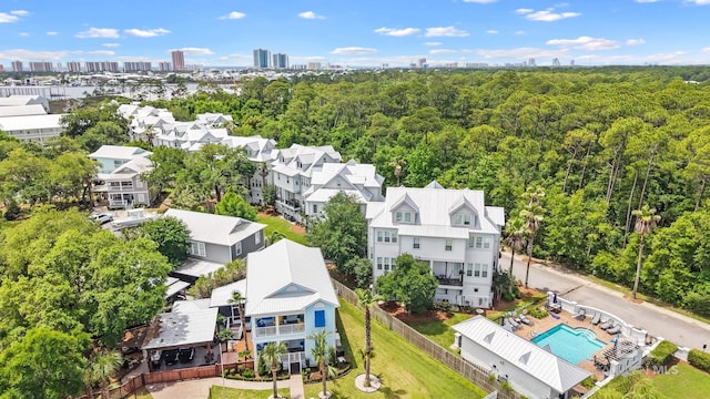 4672 Grander Ct Unit 15B, Orange Beach, AL 36561 - aerial view of a pool area and a heavily wooded area