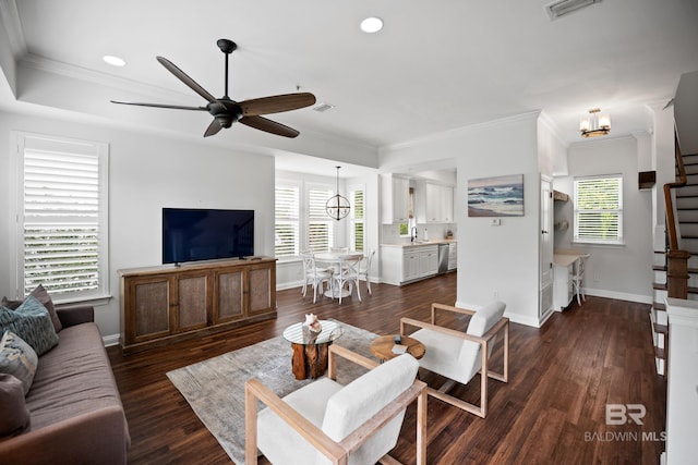 4672 Grander Ct Unit 15B, Orange Beach, AL 36561 - living room with a chandelier, ornamental molding, stairs, a ceiling fan, and baseboards