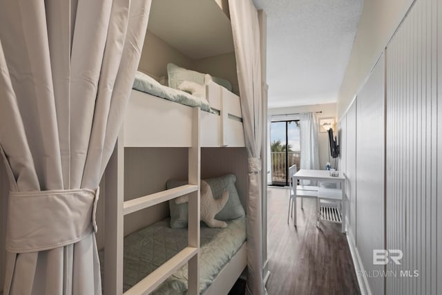 bedroom featuring wood-type flooring