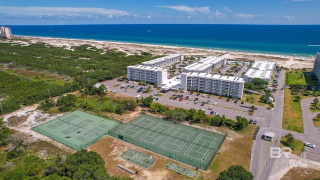 bird's eye view featuring a water view and a view of the beach