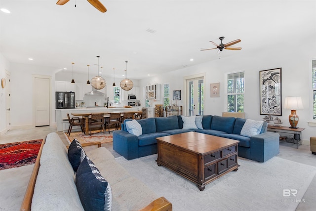 living room with ceiling fan