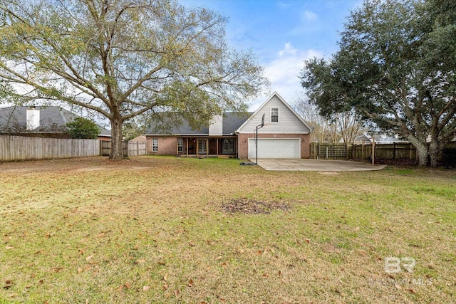 view of front of house with a front lawn and a garage