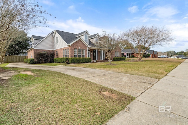 view of front of property with a front lawn