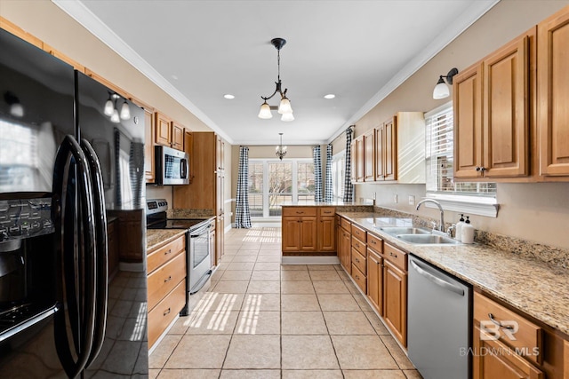 kitchen with an inviting chandelier, stainless steel appliances, light tile patterned floors, sink, and decorative light fixtures