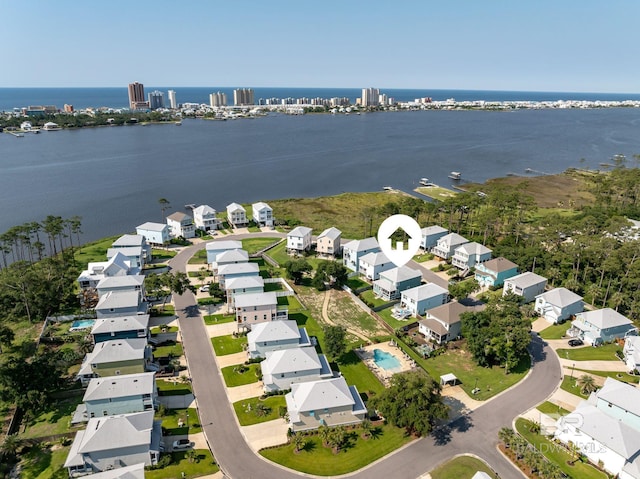 drone / aerial view featuring a water view