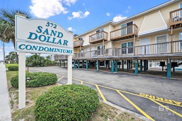 372 E Beach Blvd Unit 14, Gulf Shores, AL 36542 - view of commercial property featuring covered and uncovered parking
