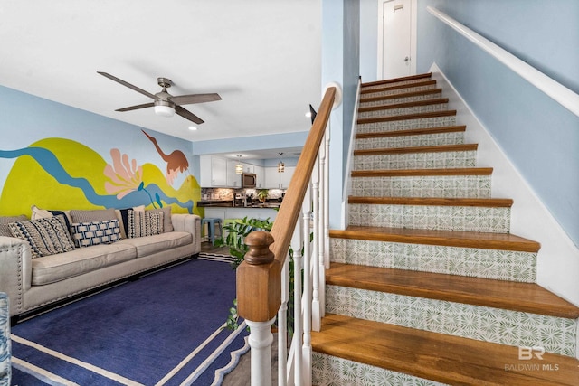 372 E Beach Blvd Unit 14, Gulf Shores, AL 36542 - staircase with a ceiling fan