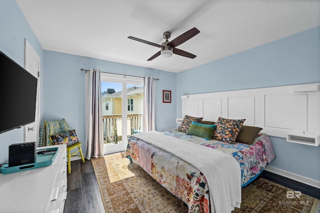 372 E Beach Blvd Unit 14, Gulf Shores, AL 36542 - bedroom with access to outside, dark wood-style floors, a ceiling fan, and baseboards