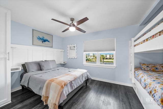 372 E Beach Blvd Unit 14, Gulf Shores, AL 36542 - bedroom with dark wood-type flooring, ceiling fan, and baseboards