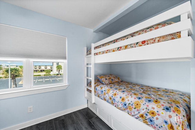 372 E Beach Blvd Unit 14, Gulf Shores, AL 36542 - bedroom with dark wood-style flooring and baseboards
