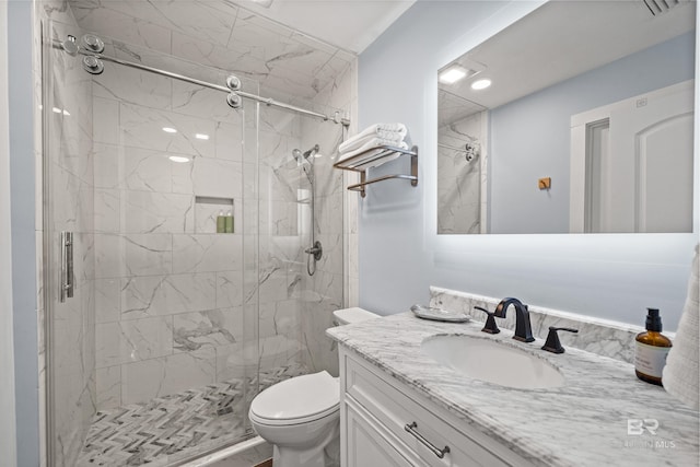 372 E Beach Blvd Unit 14, Gulf Shores, AL 36542 - bathroom featuring a shower stall, vanity, and toilet