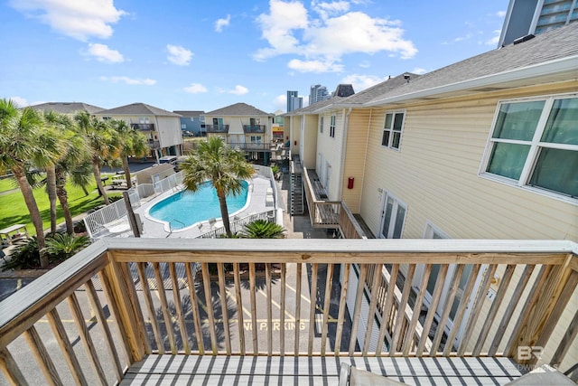 372 E Beach Blvd Unit 14, Gulf Shores, AL 36542 - wooden terrace with a residential view and a community pool