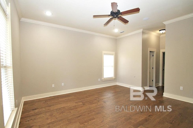 unfurnished room with ceiling fan, dark hardwood / wood-style flooring, and ornamental molding