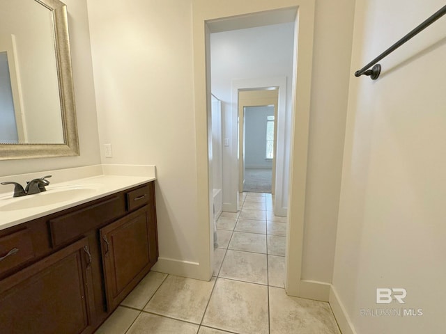 bathroom featuring tile patterned floors and vanity