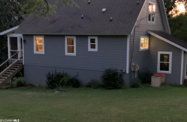 view of property exterior featuring a yard