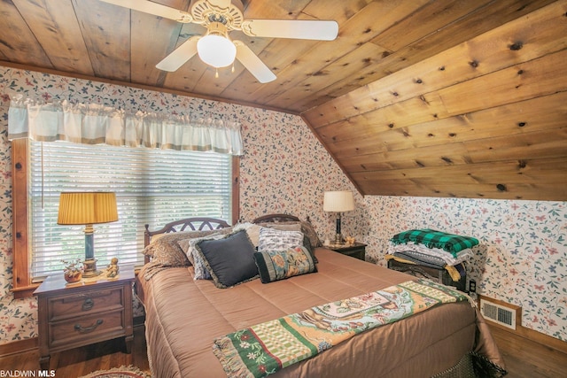 bedroom with dark hardwood / wood-style floors, wooden ceiling, and vaulted ceiling