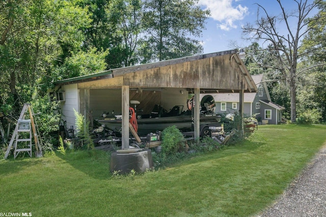 view of shed / structure featuring a yard