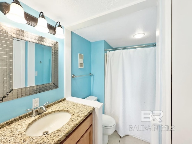 full bath featuring tile patterned floors, curtained shower, toilet, and vanity