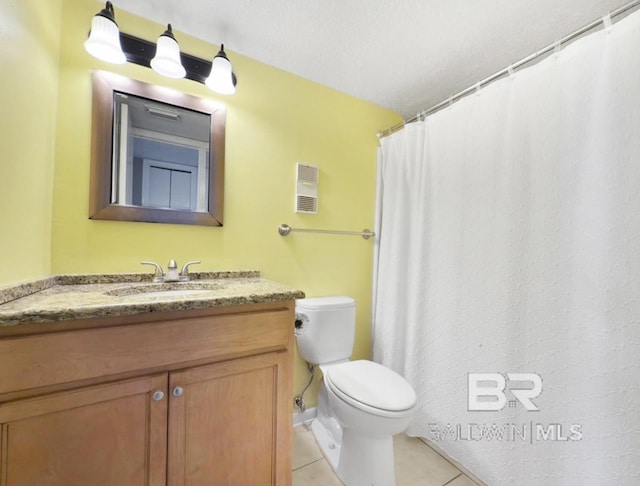 bathroom with vanity, a shower with curtain, visible vents, tile patterned floors, and toilet