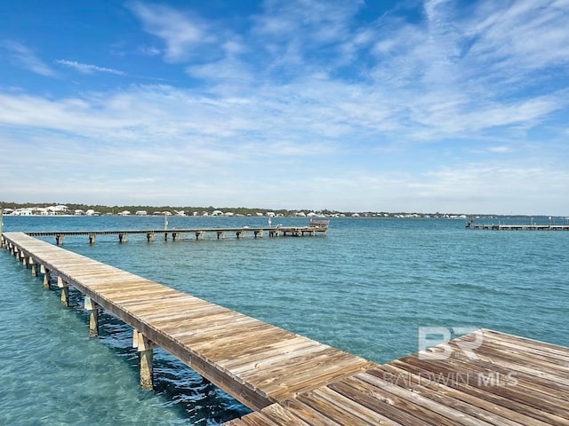 view of dock with a water view