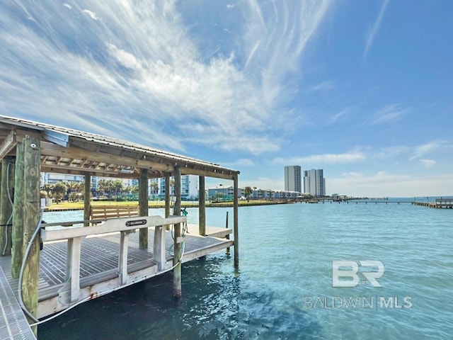 dock area featuring a water view