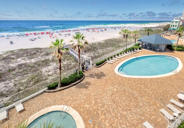 24770 Perdido Beach Blvd Unit 402, Orange Beach, AL 36561 - community pool with view of water and beach and fence