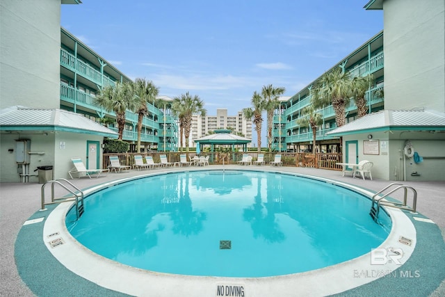952 W Beach Blvd Unit 106, Gulf Shores, AL 36542 - community pool with a gazebo and a patio