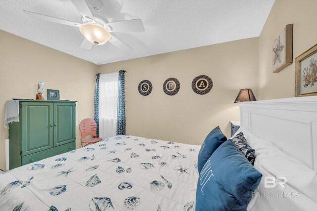 952 W Beach Blvd Unit 106, Gulf Shores, AL 36542 - bedroom featuring a ceiling fan