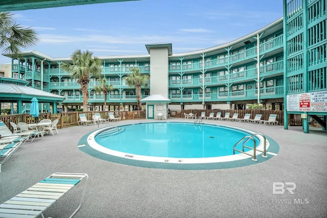 952 W Beach Blvd Unit 106, Gulf Shores, AL 36542 - community pool featuring a gazebo and a patio