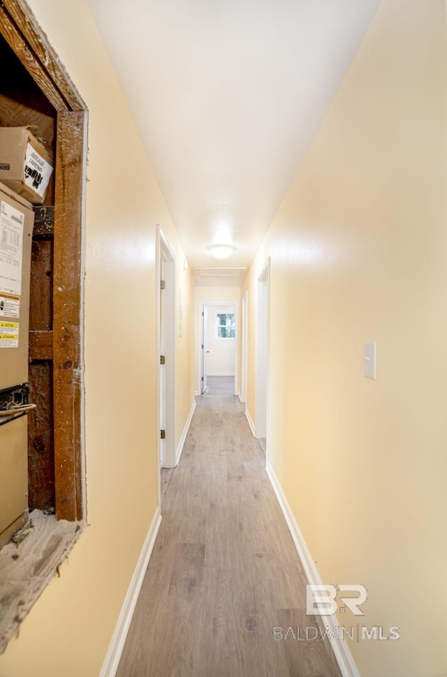 109 Palmer St, Brewton, AL 36426 - hallway with baseboards and light wood finished floors
