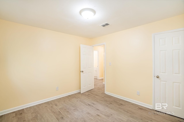 109 Palmer St, Brewton, AL 36426 - empty room featuring visible vents, baseboards, and light wood finished floors