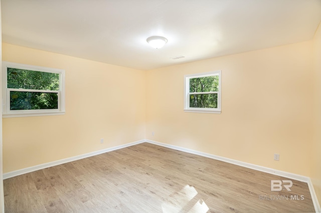 109 Palmer St, Brewton, AL 36426 - spare room featuring light wood-type flooring and baseboards