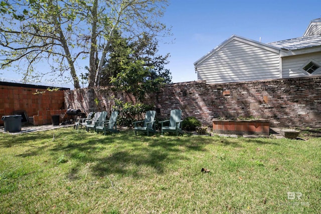 view of yard with fence