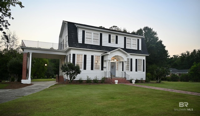 view of front of house with a lawn