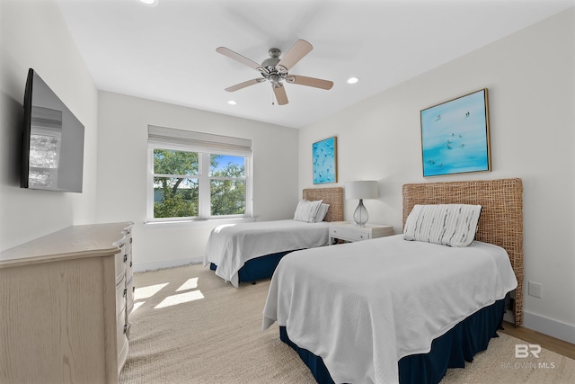 bedroom with recessed lighting, ceiling fan, and baseboards