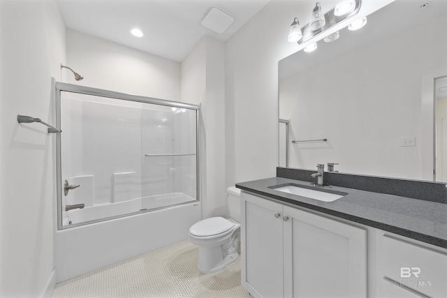 bathroom featuring shower / bath combination with glass door, vanity, and toilet