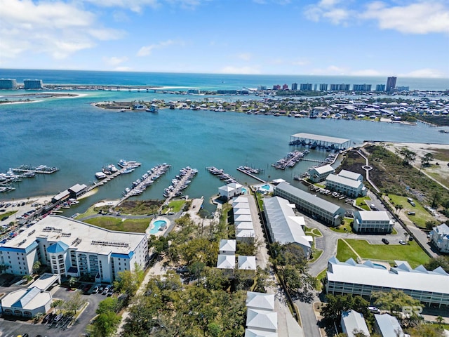 bird's eye view featuring a water view and a city view