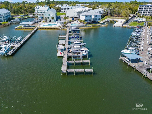 birds eye view of property featuring a water view