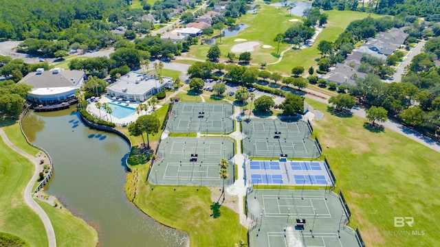 drone / aerial view with a water view and a residential view